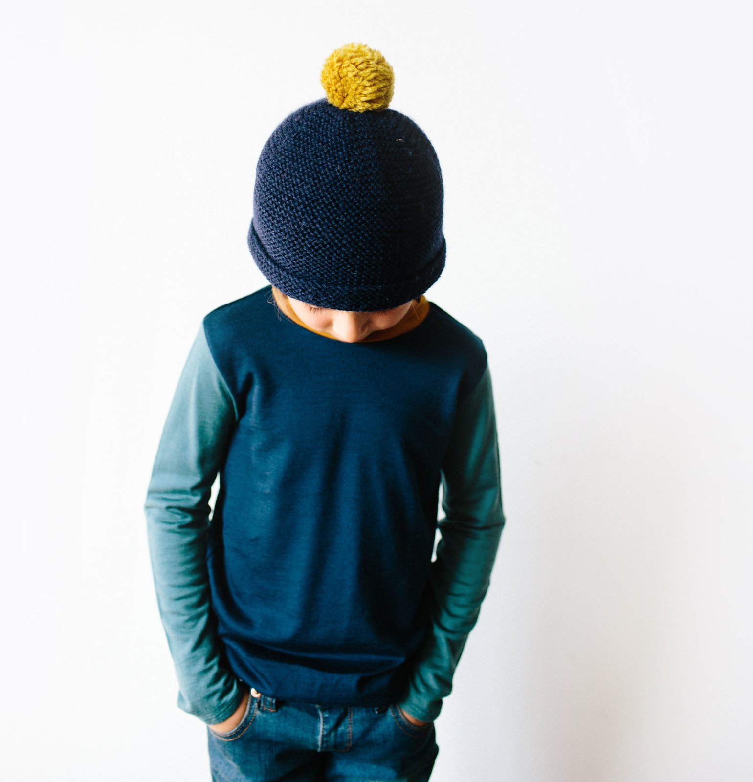 Image of Navy merino top with dusty blue sleeves